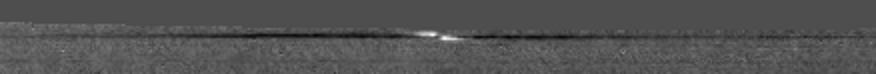Saturnian "Propeller": Bl�riot
NASA's Cassini Spacecraft captured a Propeller-shaped Disturbance in one of Saturn's Rings created by a moon that is too small to be seen here.
The moon, likely about 1 Km (a little more than half a mile) across, is invisible at the center of the image. However, it is larger than many other "Propeller" moons and has cleared ring material from the dark wing-like structures to its left and right in the image. Disturbed ring material closer to the moon reflects Sunlight brightly and appears like a white airplane propeller. This Propeller appears in the A-Ring, which is the outermost of Saturn's Main Rings.

Taken in 2006, this image is part of a growing catalogue of "Propeller Moons" that, despite being too small to be seen, enhance their visibility by creating larger disturbances in the surrounding fabric of Saturn's Rings. Cassini scientists now have tracked several of these individual Propeller Moons embedded in Saturn's disk over several years. 
These images are important because they represent the first time scientists have been able to track the orbits of objects in space that are embedded in a disk of material. Continued monitoring of these objects may lead to direct observations of the interaction between a disk of material and embedded moons. Such interactions help scientists understand fundamental principles of how Solar Systems formed from disks of matter. Indeed, Cassini scientists have seen changes in the orbits of these moons, although they don't yet know exactly what causes these changes. 
Imaging scientists nicknamed the Propeller shown here "Bleriot" after a French aviator named Louis Bleriot. 

The Propeller's structure is about 5 Km (approx. 3 miles) in the radial dimension -- the dimension moving directly outward from Saturn. The dark wings appear approx. 1100 Km (about 700 miles) in the azimuthal (longitudinal) dimension, while the central propeller structure is roughly 110 Km (about 70 miles) long.

See PIA12792 to watch a movie of "Bleriot." PIA11672 shows the giant propeller "Earhart" named after another aviator, Amelia Earhart. See PIA07791 and PIA07792 to learn more about propeller shapes and to see smaller propellers.

This image has been re-projected so that orbiting material moves to the right and Saturn is down. The Propeller was seen at the edge of the camera's field of view when the image was taken, so some data were missing; the blank space at the top of the image was filled in with a gray color. Scale in the original image was approx. 2 Km (about 1,3 miles) per pixel. Image scale in this re-projected view is about 1 Km (a little more than half a mile) per pixel.

This view looks toward the Southern, Sunlit side of the Rings from about 30° below the Ring-Plane. The image was taken in Visible Light with the Cassini Spacecraft narrow-angle camera on Dec. 15, 2006. The view was acquired at a distance of approx. 463.000 Km (about 288.000 miles) from Saturn and at a Sun-Saturn-Spacecraft, or Phase, Angle of 15°.
Parole chiave: Saturn - Propeller