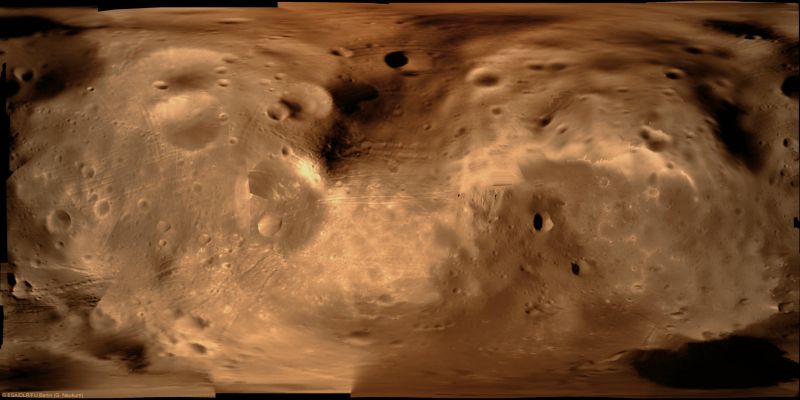 Phobos: Global Map (False Colors)
Caption ESA:"This mosaic image is composed by 53 pictures obtained by the Super Resolution Channel (or SRC, a part of the High Resolution Stereo Camera experiment) on board ESA’s Mars Express. 
The SRC images covered 70% of the moon's surface. The remaining area is filled with 16 images previously obtained by NASA’s Viking mission. 
The mean resolution is 12 mt/pixel". 
Parole chiave: Phobos