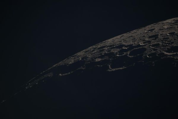 The Lunar Limb and the Terminator Line
art002e014045 (April 6, 2026) - This view of the Moon captures the Terminator — the shifting boundary between day and night — where sunlight grazes the surface at a low angle. 
Taken by the crew during the Artemis II Mission, the lighting accentuates the Moon’s rugged terrain, casting long shadows that reveal the depth and structure of craters, ridges, and surrounding highlands.
Parole chiave: The Moon
