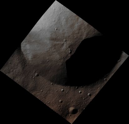 In the Shadows... (Absolute Natural Colors; credits for the additional process. and color.: Dr Paolo C. Fienga - Lunexit Team)
This image, one of the first obtained by NASA's Dawn Spacecraft in its low altitude mapping orbit, shows part of the Rim of a (relatively) fresh Unnamed Crater. The Terrain shown here is located in an area known as the Heavily Cratered Terrain in the Northern Hemisphere of 4-Vesta. 

The image, taken by Dawn's framing camera, is centered at around 17° North Latitude and 77° East Longitude. It was obtained on Dec. 13, 2011, from an altitude of approx. 119 miles (about 191 Km). It covers an area of about 11 by 11 miles (such as approx. 18 by 18 Km).
Parole chiave: Asteroids - 4 Vesta