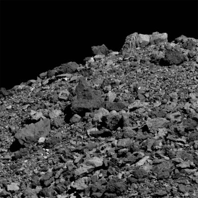 101955 Bennu - Boulderland
Caption NASA:"An abundance of Boulders litters the Surface of the Asteroid 101955 Bennu in this dramatic close-up from the OSIRIS-REx Spacecraft. 
Taken on March 28 from a distance of just 3,4 Km (approx. 2,1 miles) the field of view is about 50 meters across while the light colored boulder at top right is about 4,8 meters tall. 
Likely a loose conglomerate rubble pile Asteroid, Bennu itself spans less than 500 meters. That's about the height of the Empire State Building. 
Mapping the near Earth Asteroid since the Spacecraft's arrival in December of 2018, the OSIRIS-REx mission plans a TAG (Touch-and-Go) maneuver for July 2020 to sample Bennu's rugged Surface, returning the sample to planet Earth in September 2023. Citizen scientists have been invited to help choose the sample collection site". 
Parole chiave: Asteroids - 101955 Bennu