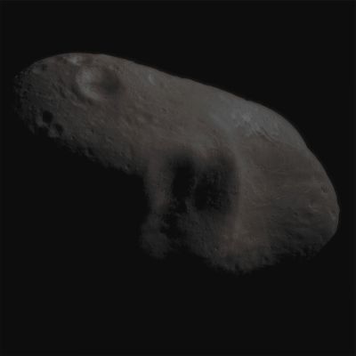 The "Saddle Region" (Absolute Natural Colors; credits for the additional process. and color.: Dr Paolo C. Fienga/Lunar Explorer Italia/Italian Planetary Foundation)
Caption NASA:"This image mosaic, showing Eros' Saddle and a shadowed feature to its left, was taken on March 3, 2000 from a distance of 204 Km (about 127 miles). In this picture features as small as 20 meters (65 feet) across are visible. This is the best view to date of this area. The Sun is coming from the North-East illuminating a shadowed feature that consists of 3 large craters situated adjacent to each other. The two largest are each about 4-5 Km (2-3 miles) across. 
Because the Sun is very low with respect to these craters, even small topographic features cast long shadows, making them easier to see. As a result, several boulders on the crater walls can be distinguished, ranging from about 50 to 100 meters in diameter. The Saddle (on the right of the mosaic) is relatively smooth with few impact craters, and has several grooves running across it. At the top of the saddle are several curved grooves that are brighter than the surrounding surface. Unusual brightness patterns are also visible in the crater at the top left of the mosaic. The walls of the crater appear to be more reflective and its floor less reflective than nearby parts of the asteroid. 

(Mosaic of images 0127504836, 0127504898, 0127505146, 0127505208,0127505394, 0127505456)
Parole chiave: Asteroids - 433 Eros