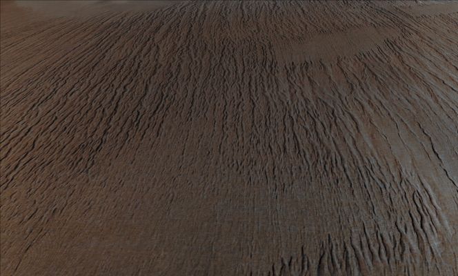 Wind-Lanes (Absolute Natural Colors; credits for the additional process. and color.: Dr Paolo C. Fienga - Lunexit Team)
Caption ESA originale:"Loose sand fragments were transported by wind, and impacted on the Bedrock, slowly removing parts of the Surface, like a sand-blaster. If the winds blow in the same direction for a long enough period, ‘Wind-Lanes’, as shown in the picture, can occur. On Earth, the remnants of these features which have not been eroded away are called ‘Yardangs’. Where the Surface consists of more resistant material, the force of the wind may not be strong enough to cause this sand-blasting. This might be the reason for the three flat regions (the first in the foreground on the left, and the other two on the top right), which measure about 17 by 9 Km".
Parole chiave: Mars from orbit - Aeolian Features - Yardangs