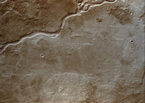 Apsus Vallis (1 - Natural Colors; credits for the additional process. and color.: Dr Paolo C. Fienga - Lunar Explorer Italia)
The channel in this image is called Apsus Vallis and it is located near the Elysium volcanic complex. Lava may have played a part in the formation of Apsus Vallis. 

Image information: VIS instrument;
Latitude: 35,3° North;
Longitude: 134,9° East;
Resolution: 19 meter/pixel
Parole chiave: Mars from orbit - Apsus Vallis