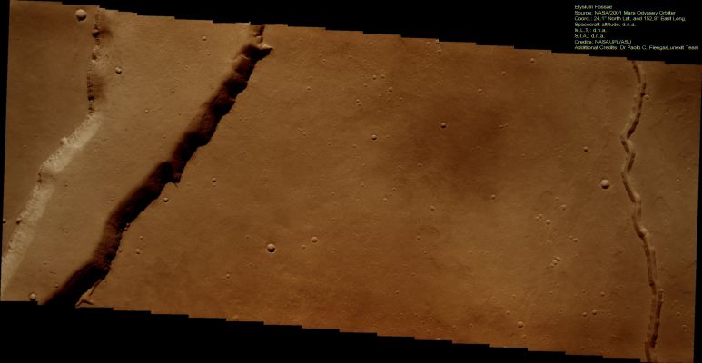 Patapsco Vallis and Elysium Fossae (Enhanced Natural Colors; credits: Dr Paolo C. Fienga - Lunexit Team)
This VIS image shows two different types of "Linear Depressions". 

The wide depression on the left of the frame is a wide trough known as "Elysium Fossae", which most likely formed due to tectonic activity. 
The Fossae is probably bounded on both sides by faults. 
The narrow depression on the right of the frame, instead, is a Lava Channel called Patapsco Vallis. 
This Channel has Lava Flows on both sides which were probably formed by over spilling of lava as it flowed down the Channel. 

Both these features are located East of Elysium Mons.
Parole chiave: Mars from orbit - Patapsco Vallis and Elysium Fossae