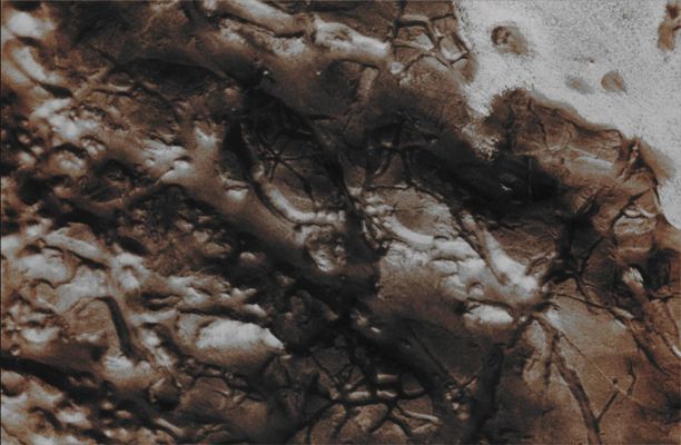 Features of Aram Chaos (Enhanced Absolute Natural Colors; credits for the additional process. and color.: Dr Paolo C. Fienga - Lunexit Team) 
Caption NASA:"This image of part of Aram Chaos shows two different surface textures with distinctly different brightnesses. The lighter layer appears to be on top (therefore younger) than the darker surface". 

Image information: VIS instrument;
Latitude: 2,1° North; 
Longitude: 338,7° East;
Resolution: 17 meter/pixel.

Parole chiave: Mars from orbit - Chaotic Terrain - Aram Chaos