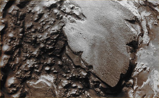 Features of Aram Chaos (Enhanced Absolute Natural Colors; credits for the additional process. and color.: Dr Paolo C. Fienga - Lunexit Team) 
Image information: VIS instrument;
Latitude: 3,8° North;
Longitude: 339,0° East;
Resolution: 18 meter/pixel.
Parole chiave: Mars from orbit - Chaotic Terrain - Aram Chaos