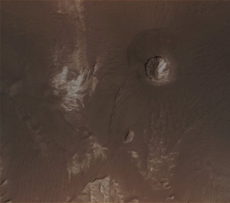 Features of Eos Chaos: Circular Butte (Natural Colors; credits for the additional process. and color.: Dr Paolo C. Fienga - Lunexit Team)
Location near: 12,9° South Lat. and 49,5° West Long. 
Image width: ~3 Km (~1,9 mi) 
Illumination from: lower left 
Season: Southern Summer
Parole chiave: Mars from orbit - Chaotic Terrain - Eos Chaos