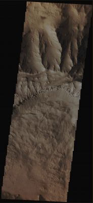 Features of Coprates Chasma (Absolute Natural Colors; credits for the additional process. and color.: Dr Paolo C. Fienga/Lunar Explorer Italia/Italian Planetary Foundation)
In this VIS image, taken by the NASA - Mars Odyssey Orbiter on March, 11, 2013 and during its 49.862nd orbit around the Red Planet, we can see that a large Landslide Deposit fills a portion of the Floor of Coprates Chasma: a huge and extremely long Canyon located the Coprates Quadrangle of Mars, at 13,4° South Latitude and 61,4° West Longitude. Coprates Chasma (---> the Abyss of Coprates) is part of the enormous Valles Marineris Canyon System and its length is of approx. 966 Km (such as about 599,88 miles).

Latitude (centered): 12,850° South 
Longitude (centered): 293,254° East 
Instrument: VIS 

This frame (which is an Original Mars Odyssey Orbiter b/w frame published on the NASA - Planetary Photojournal with the ID n. PIA 17224) has been additionally processed, magnified, contrast enhanced and then colorized in Absolute Natural Colors (such as the colors that a human eye would actually perceive if someone were onboard the NASA - Mars Odyssey Orbiter and then looked down, towards the Surface of Mars), by using an original technique created - and, in time, dramatically improved - by the Lunar Explorer Italia Team.
Parole chiave: Mars from orbit - Chasmas - Coprates Chasma