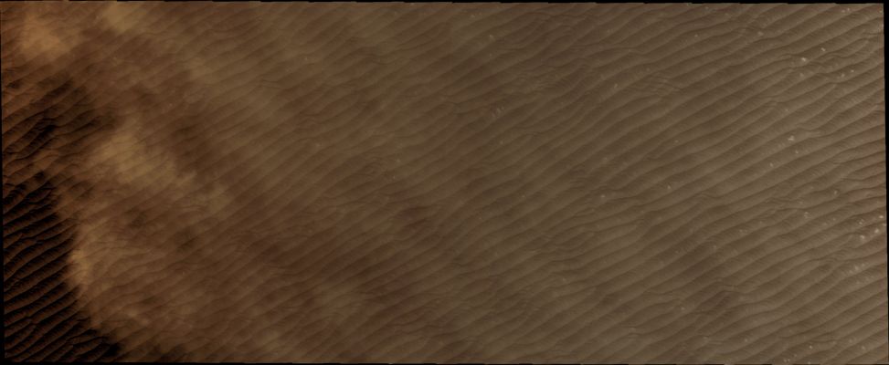 North Polar Clouds (Natural Colors; credits for the additional process. and color.: Dr Paolo C. Fienga - Lunexit Team)
Caption NASA:"Clouds are common near the North Polar Cap throughout the entire Spring and Summer. The Clouds typically cause a haze over the extensive Dunefields forming the North Polar Erg. 
This VIS image shows the edge of the Cloud-front".
Parole chiave: Mars from orbit - Clouds