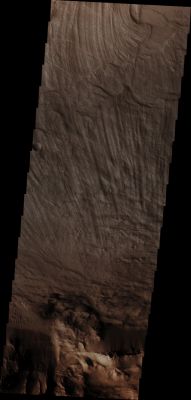 Coprates Labes (Absolute Natural Colors; credits for the additional process. and color.: Dr Paolo C. Fienga/Lunar Explorer Italia/Italian Planetary Foundation)
The finely ridged Materials visible in the upper portion of this NASA - Mars Odyssey Orbiter image - taken by the Spacecraft during its 49.450th orbit around the Red Planet - are huge Landslide (associated, most likely, with Mudslide) Deposits called Coprates Labes. These Deposits are found on the Floor of Coprates Chasma: a huge Canyon characterized by very steep Walls which is located in the Coprates Quadrangle of Mars, at 13,4° South Latitude and 61,4° West Longitude. Coprates Chasma is just a portion of the Valles Marineris Canyon System; it is approx. 966 Km (such as a little less than 600 miles) long and it got its name after a so-called "Classical Albedo Feature".

Latitude (centered): 11,7442° South 
Longitude (centered): 292,003° East 
Instrument: VIS 
Captured: February, 5th, 2013

This frame (which is an Original Mars Odyssey Orbiter b/w frame published on the NASA - Planetary Photojournal with the ID n. PIA 16271) has been additionally processed and then colorized in Absolute Natural Colors (such as the colors that a human eye would actually perceive if someone were onboard the NASA - Mars Odyssey Orbiter and then looked down, towards the Surface of Mars), by using an original technique created - and, in time, dramatically improved - by the Lunar Explorer Italia Team.
Parole chiave: Mars from orbit - Chasmas - Coprates Chasma