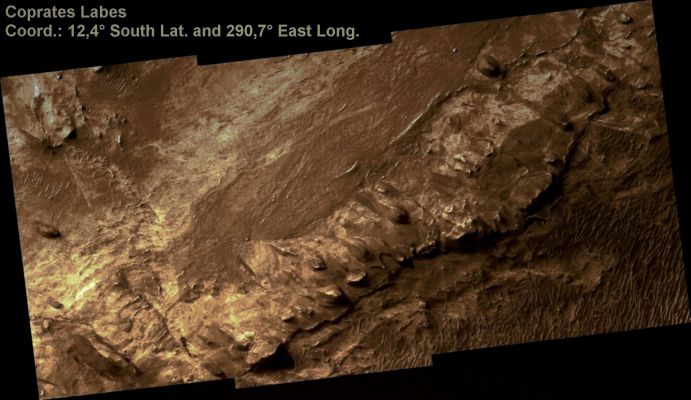 Coprates Labes (possible True Colors; credits: Lunar Explorer Italia)
Coprates Labes is a Martian canyon, part of the huge Valles Marineris System. Valles Marineris most likely formed through tectonic processes, with extensional stresses leading to collapse of the terrain that now lies at the base of the canyons. Filling most of this image, we see a raised block on the canyon bottom, which is quite possibly a horst—a block bounded by faults that separate it from sunken blocks on each side. The raised block is heavily eroded, possibly by wind; this erosion has exposed its internal layering, especially at the Southeastern margin of the block. 
Here we see asymmetric erosion features with shallow slopes trailing off to the North-West, suggesting that southeasterly winds dominate the flow through this Region. The arrangement of dunes and ripples in the lower right portion of the image confirms this prevailing wind direction. 
Finally, dark-toned material appears to have flowed from North-East to South-West along the block, possibly moving in a very fluid debris flow. 
Parole chiave: Mars from orbit - Coprates Labes