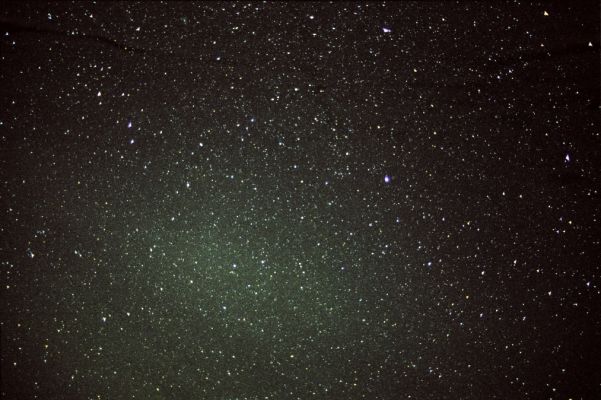 The Gegenshein (or "Counter Glow") Effect in Pisces
Da "NASA - Picture of the Day", del 26 Dicembre 2006:"If you look carefully enough, you can even see the glow of the Sun in the opposite direction. At night this glow is known as the Gegenschein (German for "Counter Glow"), and can be seen as a faint glow in an extremely dark sky. The Gegenschein is sunlight back-scattered off small interplanetary dust particles. These dust particles are millimeter sized splinters from asteroids and orbit in the ecliptic plane of the planets. 
Pictured above, the gegenschein is seen superposed toward the constellation of Pisces. The Gegenschein is distinguished from Zodiacal Light by the high angle of reflection. During the day, a phenomenon similar to the Gegenschien - called "The Glory" - can be seen in reflecting air or clouds opposite the Sun from an airplane".
Parole chiave: The Sky