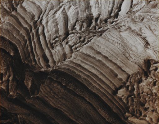 Beautiful Layers inside Becquerel Crater: Human Vision (Absolute Natural Colors; credits for the additional process. and color.: Dr Paolo C. Fienga - Lunexit Team)
Original caption:"This MGS-MOC image shows light-toned, layered, Sedimentary Rock Outcrops in Becquerel Crater , located in the Western Arabia Terra Region. The Crater may once have hosted a lake, into which these sediments were deposited. Although the fine, detailed layering in Becquerel was not known until the MGS-MOC first began to image these materials in 1999, the presence of a grossly-layered, light-toned feature was known from Viking orbiter images and was speculated from those data to possibly represent evidence for the presence of a former lake".

Location near: 21,5° North Lat. and 8,2° West Long.
Image width: ~3 Km (~1,9 mi)
Season: Northern Winter 
Parole chiave: Mars from orbit - Craters - Becquerel Crater