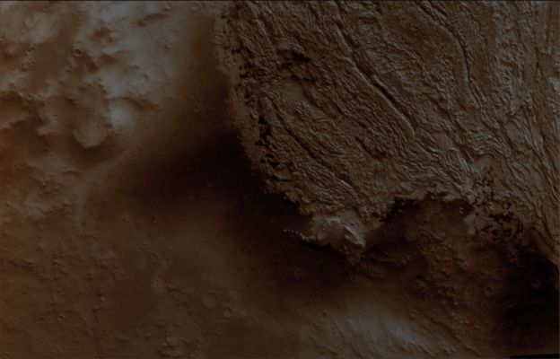 Rocky Deposit on the Floor of Becquerel Crater (Absolute Natural Colors; credits for the additional process. and color.: Dr Paolo C. Fienga - Lunexit Team)
Image information: VIS instrument
Latitude: 21,3° North 
Longitude: 352,2° East 
Resolution: 18 meter/pixel
Parole chiave: Mars from orbit - Craters - Becquerel Crater