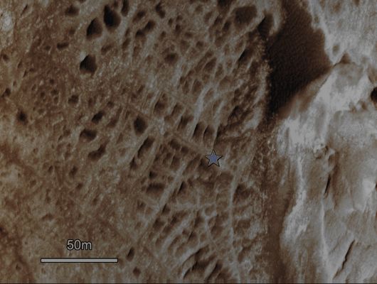 Cemented Fractures in the Mountain inside Gale Crater (Absolute Natural Colors; credits for the additional process. and color.: Dr Paolo C. Fienga - Lunexit Team)
One type of feature of scientific interest on the mountain inside Gale Crater is exposure of Cemented Fractures, evidence that groundwater once reached to at least that height of the Mountain.

This image of that part of the mountain, taken by the High Resolution Imaging Science Experiment camera on NASA's Mars Reconnaissance Orbiter, shows symmetry in how material on one side of each fracture is balanced by material on the other side. This pattern indicates that mineral-saturated groundwater once filled the fractures. The water deposited minerals on both sides of the opening, eventually filling the gap.
Parole chiave: Craters - Gale Crater