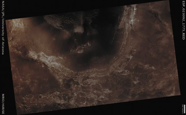 The Eastern half of Iazu Crater - Meridiani Planum (Absolute Natural Colors; credits for the additional process. and color: Dr Paolo C. Fienga - Lunexit Team)
Mars Local Time: 14:11 (Early Afternoon)
Coord. (centered): 2,7° South Lat. and 354,9° East Long.
Spacecraft altitude: 272,8 Km (such as about 170,5 miles) 
Original image scale range: 27,3 cm/pixel (with 1 x 1 binning) so objects ~ 82 cm across are resolved 
Map projected scale: 25 cm/pixel
Map projection: EQUIRECTANGULAR 
Emission Angle: 10,6° 
Sun-Mars-Spacecraft (or "Phase") Angle: 25°
Solar Incidence Angle: 35° (meaning that the Sun is about 55° above the Local Horizon)
Solar Longitude: 320,2° (Northern Winter)
Credits: NASA/JPL/University of Arizona
Additional process. and coloring: Dr Paolo C. Fienga - Lunar Explorer Italia
Parole chiave: Mars from orbit - Craters - Iazu Crater