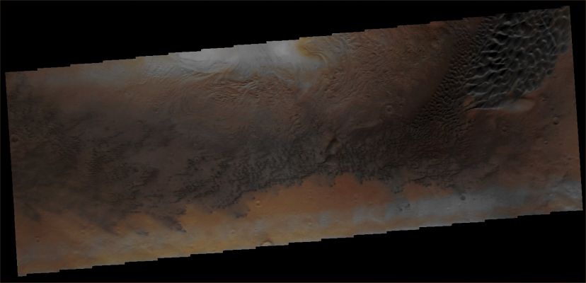 Features of Moreux Crater (Extremely Enhanced Absolute Natural Colors; credits for the additional process. and color: Dr Paolo C. Fienga - Lunexit Team)
Caption NASA originale"This frame shows part of the interior of Moreux Crater; many isolated Dunes and a large Dunefield are clearly visible. The image was collected during the Northern Spring Season". 

Image information: VIS instrument;
Latitude 41,9° North; 
Longitude 44,1° East (such as 315,9° West). 
35 mt/pixel resolution.
Parole chiave: Mars from orbit - Craters - Moreux Crater