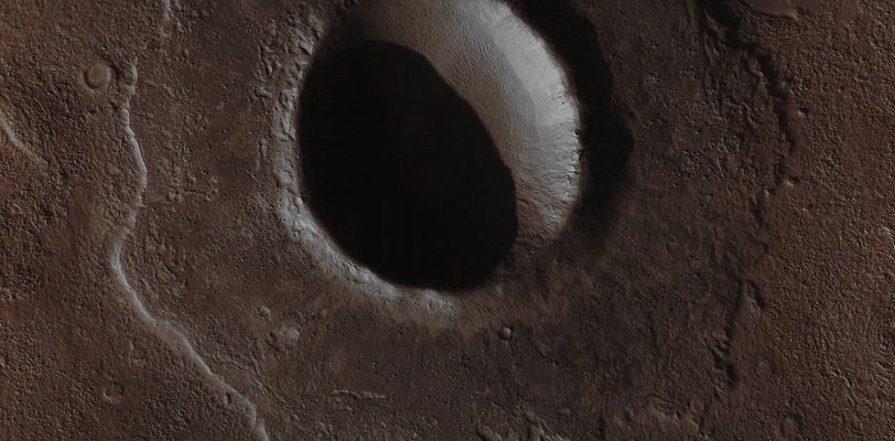 Unnamed Crater with Pedestal (Absolute Natural Colors; credits for the additional process. and color.: Dr Paolo C. Fienga - Lunar Explorer Italia)
This Mars Global Surveyor (MGS) Mars Orbiter Camera (MOC) image shows an Unnamed Impact Crater, a little over 2 Km (> 1,2 mi) in diameter, located in Noachis Terra near 50,4° South and 14,3° West. The Crater's Bouldery Ejecta Blanket has protected underlying material from being eroded away by wind, leaving the Ejecta up on a low Pedestal. This picture covers an area about 3 Km (approx. 1,9 miles) across, and is illuminated by sunlight from the lower left.
Parole chiave: Mars from orbit - Craters - Unnamed Crater with Pedestal