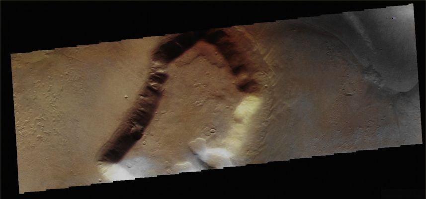 Features of Deuteronilus Mensae (Absolute Natural Colors; credits for the additional process. and color: Dr Paolo C. Fienga - Lunexit Team)
Caption NASA originale:"This color image of a Mesa and surrounding Debris Apron (---->come "blanket". tecn.: distesa di detriti) is located in the Deuteronilus Mensae Region. This image was collected during the Northern Spring season". 

Image information: VIS instrument. 
Latitude 42,7° North; 
Longitude 24,5 East (335,5 West). 
35 meter/pixel resolution. 
Parole chiave: Mars from orbit - Deuteronilus Mensae Region