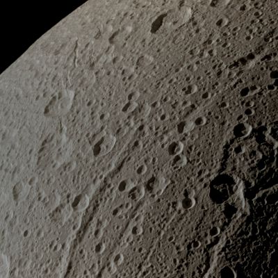 Dione (Absolute Natural Colors; credits for the additional process. and color.: Dr Paolo C. Fienga - Lunexit Team)
Caption NASA:"The Cassini Spacecraft swooped in for a close-up of the cratered, fractured surface of Saturn's moon Dione in this image taken during the Spacecraft's Jan. 27, 2010, non-targeted Fly-By.
Cassini came within about 45.000 Km (approx. 28.000 miles) of the moon during the Fly-By, and this image was acquired at a distance of approx. 46.000 Km (about 29.000 miles).

This view looks toward the Leading Hemisphere of Dione. North on Dione is up. The image was taken in Visible Light with the Cassini Spacecraft narrow-angle camera. 
The view was acquired at a Sun-Dione-Spacecraft, or Phase, Angle of 108°. Image scale is roughly 270 meters (886 feet) per pixel".
Parole chiave: Saturnian Moons - Dione