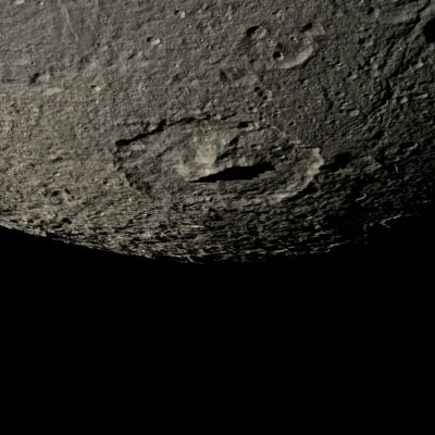 Erulus Crater (Absolute Natural Colors; credits for the additional process. and color.: Dr Paolo C. Fienga - Lunexit Team)
Caption NASA:"The Cassini spacecraft snapped this shot of cratered Dione as it flew by the Saturnian moon on Oct. 17, 2010. The large crater at the center of the image is Erulus, which is about 120 Km, or approx. 75 miles, across. This view looks toward the Southern Latitudes of the Leading Hemisphere of Dione.

The image was taken in Visible Light with the Cassini Spacecraft narrow-angle camera. The view was acquired at a distance of approximately 41.000 Km (such as about 25.000 miles) from Dione and at a Sun-Dione-Spacecraft, or Phase, Angle of 53°. 
Image scale is roughly 240 meters (787 feet) per pixel".
Parole chiave: Saturnian Moons - Dione