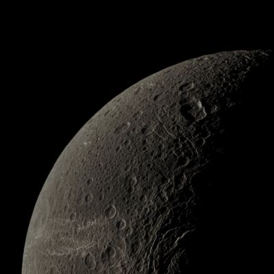 Wispy Terrain on Dione (Absolute Natural Colors; credits for the additional process. and color.: Dr Paolo C. Fienga - Lunexit Team)
Caption NASA:"Wispy Terrain reflects Sunlight brightly in the lower left of this Cassini image of the Northern Latitudes of Saturn's moon Dione.
These "Wisps" are actually Fractures located on the Trailing Hemisphere of Dione. Lit Terrain seen here is between the Trailing Hemisphere and the Saturn-facing Side of Dione. North is up.

The image was taken in Visible Light with the Cassini spacecraft narrow-angle camera on Dec. 20, 2010. The view was obtained at a distance of approx. 107.000 Km (66.447 miles) from Dione and at a Sun-Dione-Spacecraft, or Phase, Angle of 109°. Image scale is roughly 640 meters (2100 feet) per pixel".
Parole chiave: Saturnian Moons - Dione
