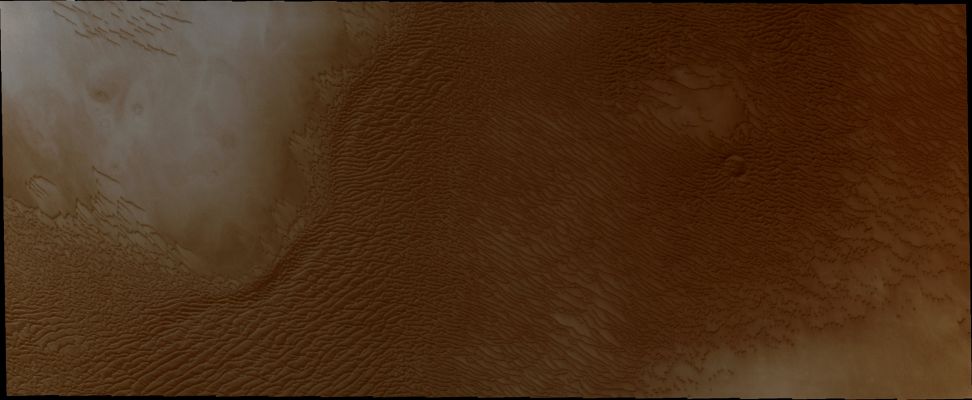 Dunes of the North Polar Erg (Natural Colors; credits for the additional process. and color.: Dr Paolo C. Fienga - Lunexit Team)
The appearance of the Dunes of the North Polar Erg (or "Sand Sea") changes as the seasons move from Winter to Summer. This Summer image shows the Dunes totally free of Frost.

Orbit Number: 38280 
Latitude: 79,0826°
Longitude: 245,52° 
Instrument: VIS 
Captured: August, 1st, 2010
M.L.T.: 07:21 (Early Morning)

Parole chiave: Mars from orbit - North Polar Features - Erg
