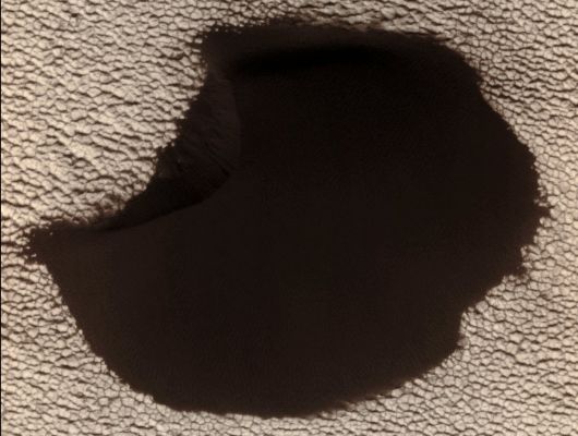 Degrading North Polar Barchan-type Dune (Absolute Natural Colors; credits for the additional process. and color.: Dr Paolo C. Fienga - Lunexit Team)
This Dune, located in the North Polar Region of Mars, showed significant changes between two images taken on June 25th, 2008 and May 21st, 2010 and revealed Landslides and Sand advancing at the Dune-Front (upper left); changes in the position of the rest of the Dune Boundary relative to the fixed, underlying Terrain and changes in the position of the Ripples located on the Dune Surface.


Parole chiave: Mars from orbit - Dune - Norther Regions