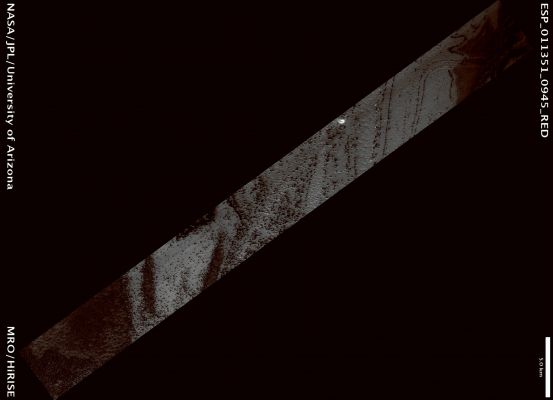 Fans on Ice (Natural Colors; credits: Lunar Explorer Italia)
Every Southern Winter the South Polar Region of Mars is covered with an approximately 1 meter deep layer of frozen CO2 (dry ice). In the Spring, when the Sun begins to warm the surface below the translucent ice, gas flow under the ice carries loose dust from the surface up onto the top.
The dust falls to the surface in "Fans", whose orientation is determined by the direction of the local wind flow. Fans from one source region pointing in multiple directions show how the wind direction has changed. Narrow Fans pointing in just one direction are the most recent. Alternatively, the vent from the surface may have re-annealed, such that these Fans were formed over a very limited time span.

Mars Local Time: 18:19 (sunset - early evening)
Coord. (centered): 85,2° South Lat. and 181,6° East Long.
Spacecraft altitude: 247,4 Km (such as about 154,6 miles) 
Original image scale range: 99,0 cm/pixel (with 1 x 1 binning) so objects ~2,97 mt across are resolved 
Map projected scale: 1 mt/pixel
Map projection: EQUIRECTANGULAR 
Emission Angle: 4,2° 
Phase Angle: 86,4°
Solar Incidence Angle: 90° (meaning that the Sun is about 0° on the Local Horizon)
Solar Longitude: 181,2° (Northern Autumn)
Credits: NASA/JPL/University of Arizona
Additional process. and coloring: Lunar Explorer Italia
Parole chiave: Mars from orbit - South Polar Features - Fans