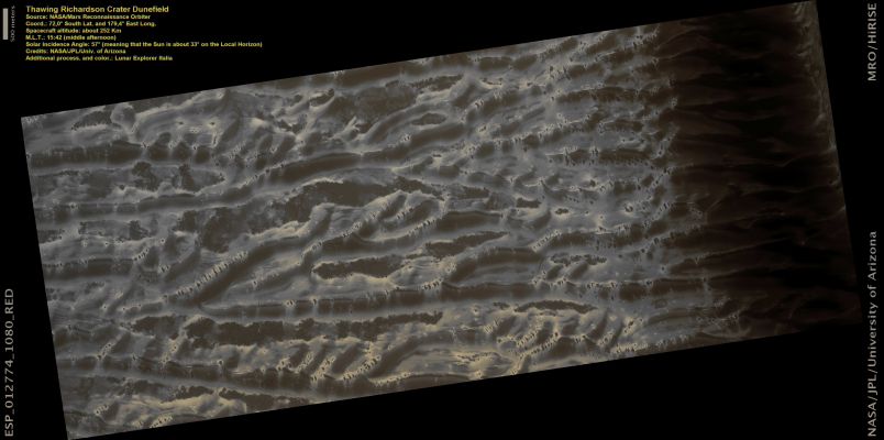 Defrosting Dunes in Richardson Crater (ctx frame - Natural Colors; credits: Lunar Explorer Italia)
This image shows a portion of the Dunes that fill Richardson Crater, a 55-Km-diameter crater in the South Polar Region of Mars and a frequent repeat target for the HiRISE camera. 

During Southern Fall and Winter, these Dunes are coated with seasonal CO2 frost, which then sublimates into the Atmosphere as the temperature rises in Spring and Summer.
This Natural Color shows a boundary between Dunes that are mostly covered with Seasonal Frost and Dunes that have mostly thawed. The color of many dunes on Mars can change dramatically depending on the Season. Frost tends to be very bright in HiRISE images, particularly in the blue-green filter, but the Dune sand itself is very dark.

The dark streaks and spots on the frost-covered regions represent areas that are in the process of thawing out. In some areas, the frost has sublimated away. In others, a small avalanche of sand or dust may have spilled on top of the frost. Some of them may also be patches of coarse-grained ice that are relatively clear so that we can see the sand below. As Spring advances toward Summer in the South on Mars, these Dunes continue to appear darker and more red to HiRISE.

Dunes near the Polar Regions of Mars are studied both by scientists who are interested in the effects of this seasonal cycle of thawing and frosting over, and by scientists who wait for the frost to disappear so that they can study the dunes themselves.
Parole chiave: Mars from orbit - Craters - Richardson Crater