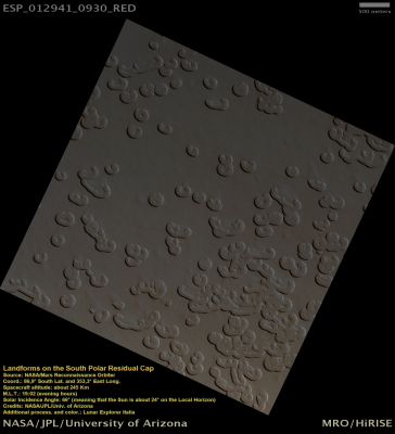 Landforms on the South Polar Residual Cap (Natural Colors; credits: Lunar Explerer Italia)
This HiRISE image is located on the Carbon-Dioxide (CO2) rich Residual South Polar Ice Cap near 86° South Lat. and 353° East Long. 
These rounded landforms evolve relatively quickly and erode into the surface of the Ice Cap (approximately 4-5 meters or 15 feet per year).

Their interesting shapes make for a striking appearance on the Surface.
Parole chiave: Mars from orbit - South Polar Regions - Swiss-cheese Terrain