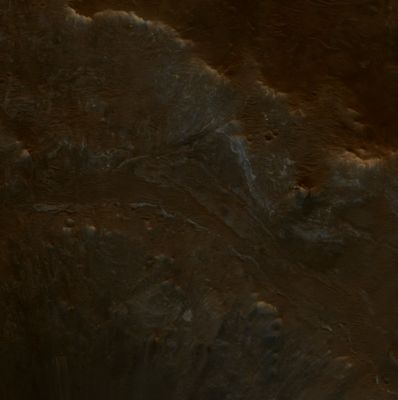 Dark Syrtis Major (EDM - Natural Colors; credits: Dr Paolo C. Fienga - Lunexit Team)
In this EDM of Syrtis Major, ancient Noachian Bedrock is exposed. This is rock made in the early Soles of Martian History. 
An Impact Crater (about 50 Km in diameter) into this rock exposes Layers along its Wall. These Layers may be made from several different geologic materials, such as Lava Flows, Debris from nearby impact craters, or deposits of Dust or Sand. 
They may also represent different periods of deposition and erosion. The Layers are of varying thickness: some of the lighter, resistant units are less than 10 meters thick, while some of the darker layers might be over 100 meters thick.
Parole chiave: Mars from orbit - Syrtis Major Region