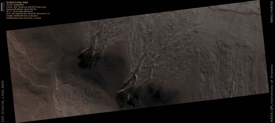 Unnamed Crater with Gullies (Absolute Natural Colors; credits for the additional process. and color.: Dr Paolo C. Fienga - Lunar Explorer Italia)
Mars Local Time: 14:27 (Early Afternoon)
Coord. (centered): 49,9° South Lat. and 33,9° East Long.
Spacecraft altitude: 252,1 Km (such as about 157,5 miles) 
Original image scale range: 50,4 cm/pixel (with 2 x 2 binning) so objects ~ 1 mt and 51 cm across are resolved 
Map projected scale: 50 cm/pixel
Map projection: EQUIRECTANGULAR
Emission Angle: 3,1° 
Sun-Mars-Spacecraft (or "Phase") Angle: 47,6°
Solar Incidence Angle: 45° (meaning that the Sun is about 45° above the Local Horizon)
Solar Longitude: 319,4° (Northern Winter)
Credits: NASA/JPL/University of Arizona
Additional process. and coloring: Dr Paolo C. Fienga - Lunar Explorer Italia
Parole chiave: Mars from orbit - Craters - Unnamed Crater with Gullies