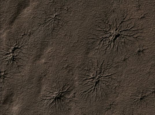 Radial Channels carved by CO2 - a.k.a.: The "Spiders" (EDM - Natural Colors; credits: Lunexit)
In this EDM we can see, now that all the seasonal frost is gone, the actual appearence of the "Spiders" and we can both use stereo images (when available) or shadows (if any) to measure the depth of the Channels carved into the ground (which, by the way, are usually 1 or 2 meters deep).
Parole chiave: Mars from orbit - Southern Features - Spiders