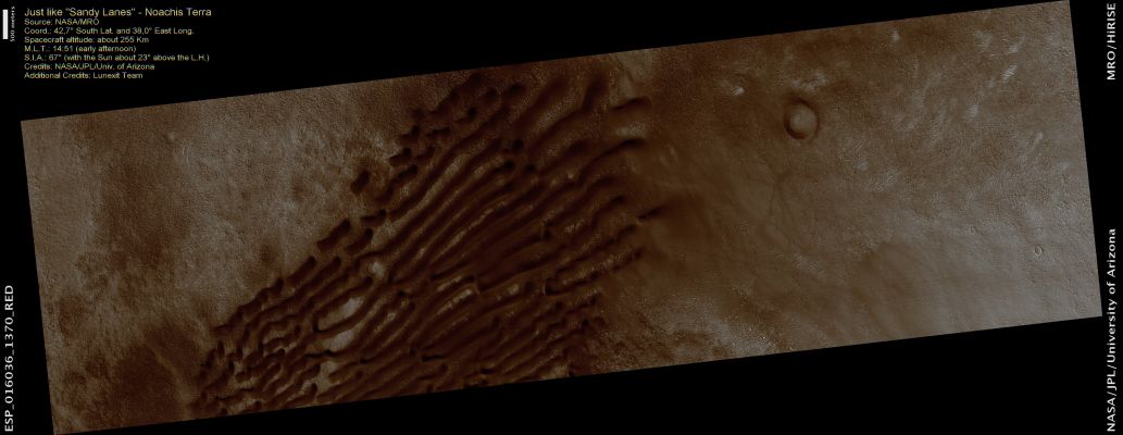Dunes in Noachis Terra (CTX Frame - Natural Colors; credits: Dr Paolo C. Fienga - Lunexit Team)
Dunes of sand-sized materials have been trapped on the floors of many Martian Craters. 
This is one example, from an Unnamed Crater located in Noachis Terra, West of the giant Hellas Impact Basin.

The most extensive Linear Dunefields known in the Solar System are on Saturn's largest moon Titan. 
But Titan, as to Mars, has a very different environment and composition and so, at a meter-scale resolution (not available yet, unfortunately) the Titanian Dunes should look (better yet: they certainly ARE) very different from the Martian ones.
Parole chiave: Mars from orbit - Dunes - Noachis Terra Region