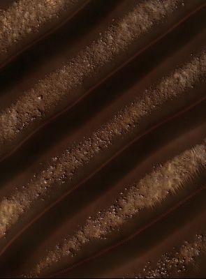 Dunes in Noachis Terra (EDM n.1 - Natural Colors; credits: Dr Paolo C. Fienga - Lunexit Team)
The Dunes here are linear, thought to be due to shifting wind directions. 
In places, each Dune is remarkably similar to the adjacent one, including a reddish (or dust colored) band on the North-Eastern facing slopes. 
Furthermore, very large Angular Boulders litter the floor between the Dunes.
Parole chiave: Mars from orbit - Dunes - Noachis Terra Region