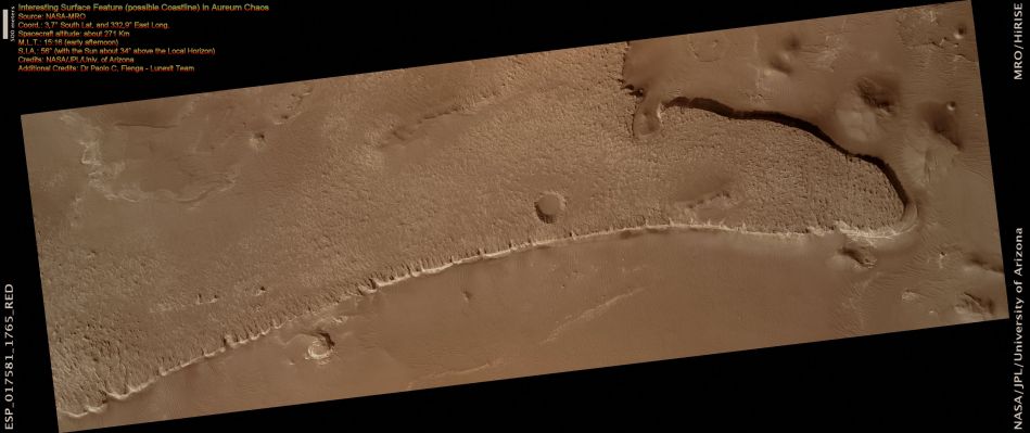 Exposed Light Material in Upland Region in Aureum Chaos (Natural Colors; credits for the additional process. and color.: Dr Paolo C. Fienga - Lunexit Team)
The Plateau visible in this image is located within Aureum Chaos. Chaotic Terrains on Mars are blocky, fractured regions of flat-topped hills, plateaus, plains and depressions thought to have formed by the collapse of the heavily cratered uplands.

Large Outflow Channels appear to emerge from Aureum Chaos and other Chaotic Terrains leading researchers to posit that these large collapse regions were formed by the catastrophic release of ground water. Aureum Chaos is located just to the North-East of Valles Marineris adjacent to Margaritifer Terra, and it has a diameter of approximately 368 kilometers.

The steep-sided Plateau in this image has a sharp, undulating surface possibly etched out and eroded by persistent winds. These same winds may well have transported the resulting sediment to the surrounding plains helping to form the Dunes below. The Plateau slopes are steep and consist of a series of parallel bright, more resistant cliff forming layers and darker, less resistant slope material. A good way to see the differences in color between the plateau's bright layered deposits and the surrounding area is to look at some of the blocks that have fallen off the cliff onto the the dark sands below.

By studying areas of Mars such as this one, researchers hope to understand how the chaos regions formed and how their formation related to the release of ground water to form the outflow channels, if indeed the two are connected in this way.

Written by: Shawn Hart and Ginny Gulick
Parole chiave: Mars from orbit - possible Coast-Line - Aureum Chaos Region
