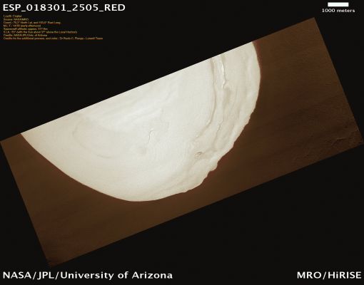 Louth Crater (CTX Frame- Natural Colors; credits for the additional process. and color.: Dr Paolo C. Fienga - Lunexit Team)
This HiRISE image shows a large Ice Mound located in Louth Crater. At 70° North (in the Region of Vastitas Borealis), this is the lowest latitude permanent deposit of water ice on Mars.
The HiRISE image, taken in early Summer, shows details of the Mound and non-ice portions of the Crater Floor. 
The Mound is characterized by rough textures and layering similar to features seen on the North Polar Layered Deposits near the Martian North Pole. Zooming in to an area in the South-Eastern part of the Mound (see the following EDMs), dark Sinuous Ridges appear.
These may be the crests of partially defrosted Dark Sand Dunes or perhaps some other feature that we do not understand. 
This is the only area on Louth where these enigmatic Ridges are found.
Parole chiave: Mars from orbit - Craters - Louth Crater