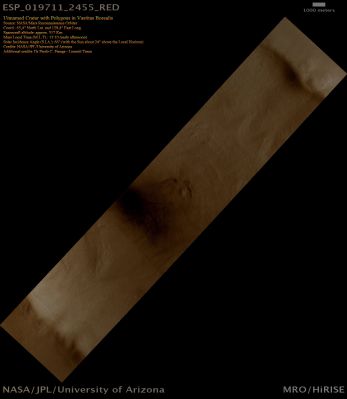 Unnamed Crater in Vastitas Borealis (Absolute Natural Colors; credits for the additional process. and color.: Dr Paolo C. Fienga - Lunexit Team)
This image covers part of a large Impact Crater located in the Northern Plains of Mars (Vastitas Borealis Region). The Crater is old and has been heavily modified by ground ice processes. The most prominent of these processes is the network of Polygonal Fractures visible throughout the image. 
These landforms are created when temperature changes over the course of a year cause ice in the ground to first expand, then contract and, in the end, break. The ground moves fractionally every time this occurs. 

At the center of the frame it can be seen that this - repetitive - process has caused the shifting of rocks and  boulders through the Surface of the Crater, thus causing them to line up along the Fractures and then form some interesting geometric patterns.
Parole chiave: Mars from orbit - Craters - Unnamed Crater - Vastitas Borealis Region