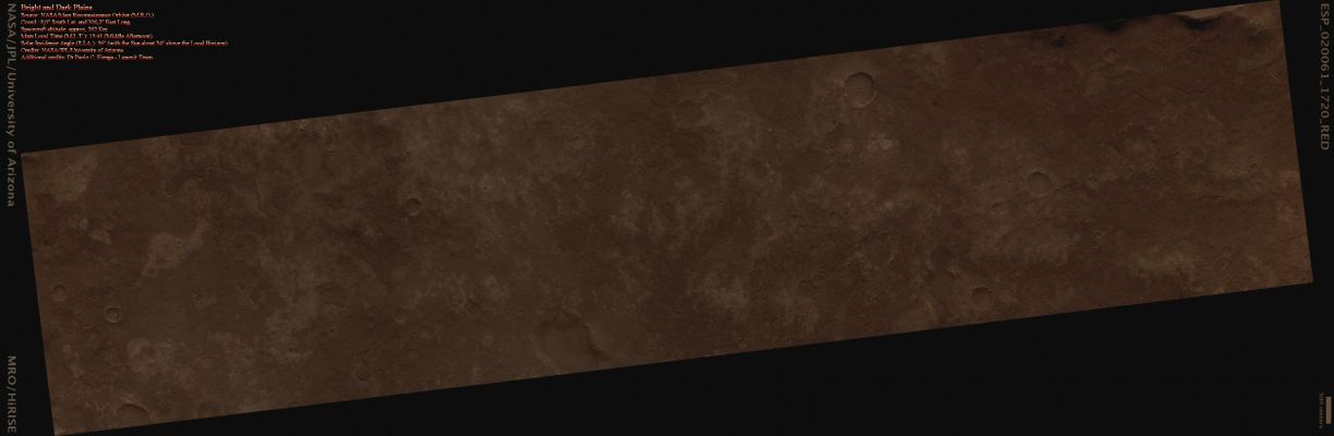 Bright and Dark Plains (Absolute Natural Colors; additional process. and color.: Dr Paolo C. Fienga - Lunexit Team)
This HiRISE image shows a mixture of bright and dark Terrain along the plains just West of Ganges Chasma.
The concentration of these bright patches adjacent to an old Impact Crater suggests that the bright patches could represent Ejecta from when the crater formed. 
This would be an interesting discovery because it would mean that a different unit underlies the Surface we now see. Alternatively, much of the Plains in this Region seem to have a dark surficial cover (probably aeolian debris). Where this darker debris has been removed by the wind, the underlying brighter substrate would be exposed.

Mineralogic information from the CRISM instrument would be very useful for determining if the bright patches contain minerals indicative of water - such as Clays - or if they are Basalts (produced from Volcanic Eruptions).
Parole chiave: Mars from orbit - Plains