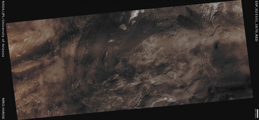 Hematite in Capri Chasma (Absolute Natural Colors; credits for the additional process. and color: Dr Paolo C. Fienga - Lunexit Team)
Mars Local Time: 14:13 (Early Afternoon)
Coord. (centered): 13,0° South Lat. and 311,9° East Long.
Spacecraft altitude: 271,3 Km (such as about 169,6 miles) 
Original image scale range: 27,1 cm/pixel (with 1 x 1 binning) so objects ~ 81 cm across are resolved 
Map projected scale: 25 cm/pixel
Map projection: EQUIRECTANGULAR 
Emission Angle: 14,2° 
Sun-Mars-Spacecraft (or "Phase") Angle: 18,5°
Solar Incidence Angle: 33° (meaning that the Sun is about 57° above the Local Horizon)
Solar Longitude: 330,6° (Northern Winter)
Credits: NASA/JPL/University of Arizona
Additional process. and coloring: Dr Paolo C. Fienga - Lunar Explorer
Parole chiave: Mars from orbit - Chasmas - Capri Chasma