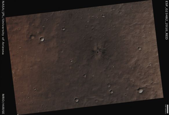 Fresh Impact Crater on the S/W Edge of Elysium Mons (Enhanced Natural Colors; credits for the additional process. and color: Dr Paolo C. Fienga - Lunexit Team)
Mars Local Time: 14:04 (early afternoon)
Coord. (centered): 20,7° North Lat. and 144,0° East Long.
Spacecraft altitude: 281,3 Km (such as about 175,8 miles) 
Original image scale range: 28,1 cm/pixel (with 1 x 1 binning) so objects ~ 84 cm across are resolved 
Map projected scale: 25 cm/pixel 
Map projection: EQUIRECTANGULAR
Emission Angle: 1,4° 
Sun-Mars-Spacecraft (or "Phase") Angle: 42,0°
Solar Incidence Angle: 43° (meaning that the Sun is about 47° above the Local Horizon)
Solar Longitude: 337,0° (Northern Winter)
Credits: NASA/JPL/University of Arizona
Additional process. and coloring: Dr Paolo C. Fienga - Lunar Explorer Italia
Parole chiave: Mars from orbit - Craters - Unnamed and (relatively) Fresh Crater