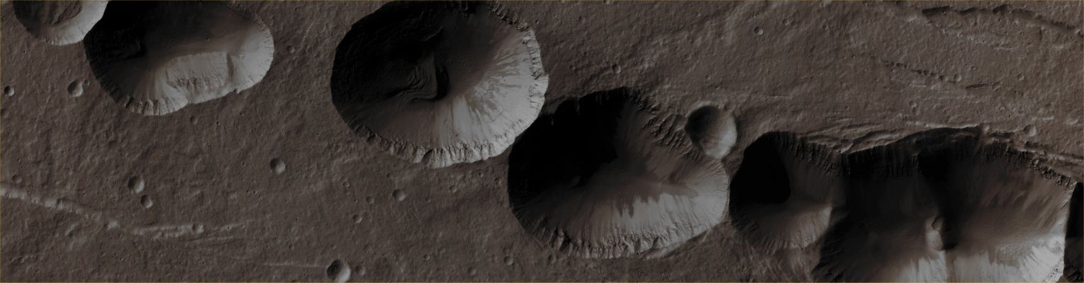 Artynia Catena (Absolute Natural Colors; credits for the additional process. and color.: Dr Paolo C. Fienga - Lunexit Team)
Mars Local Time: 13:57 (Early Afternoon)
Coord. (centered): 45,8° North Lat. and 240,4° East Long.
Spacecraft altitude: 296,2 Km (such as about 185,1 miles) 
Original image scale range: 59,3 cm/pixel (with 2 x 2 binning) so objects ~ 1 mt and 78 cm across are resolved
Map projected scale: 50 cm/pixel
Map projection: EQUIRECTANGULAR
Emission Angle: 0,4° 
Phase Angle: 59,9°
Solar Incidence Angle: 60° (meaning that the Sun is about 30° above the Local Horizon)
Solar Longitude: 341,8° (Northern Winter)
Credits: NASA/JPL/University of Arizona
Additional process. and coloring: Dr Paolo C. Fienga - Lunar Explorer Italia
Parole chiave: Mars from orbit - Volcanic Features - Pit Chain