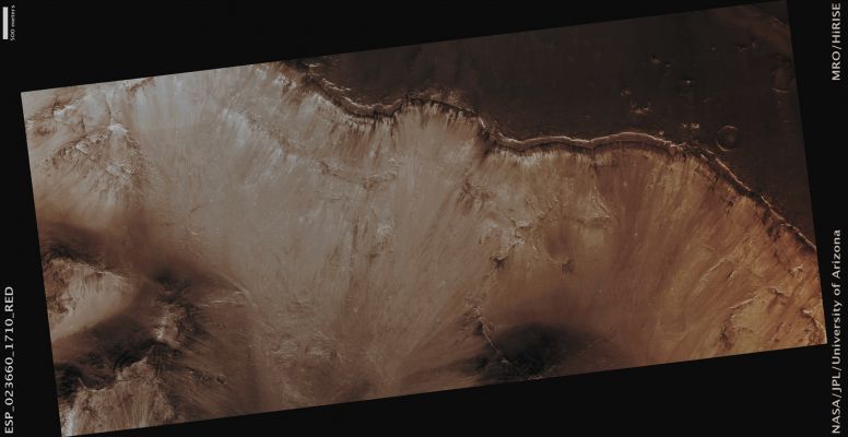 Features of Aurorae Chaos (Absolute Natural Colors; credits for the additional process. and color.: Dr Paolo C. Fienga - Lunexit Team) 
Mars Local Time: 14:11 (Early Afternoon)
Coord. (centered): 9,0° South Lat. and 327,7° East Long.
Spacecraft altitude: 265,9 Km (such as about 166,2 miles) 
Original image scale range: 53,2 cm/pixel (with 2 x 2 binning) so objects ~ 1 mt and 60 cm across are resolved 
Map projected scale: 50 cm/pixel
Map projection: EQUIRECTANGULAR
Emission Angle: 0,1° 
Sun-Mars-Spacecraft (or "Phase") Angle: 32,6°
Solar Incidence Angle: 33° (meaning that the Sun is about 57° above the Local Horizon)
Solar Longitude: 344,4° (Northern Winter)
Credits: NASA/JPL/University of Arizona
Additional process. and coloring: Dr Paolo C. Fienga - Lunar Explorer Italia
Parole chiave: Mars from orbit - Chaotic Terrain - Aurorae Chaos