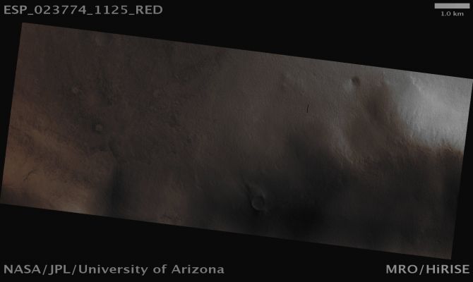 Possible Signs of Hydration (Absolute Natural Colors; credits for the additional process. and color.: Dr Paolo C. Fienga - Lunar Explorer Italia)  
Mars Local Time: 14:35 (Early Afternoon)
Coord. (centered): 67,3° South Lat. and 105,4° East Long.
Spacecraft altitude: 249 Km (such as about 155,6 miles) 
Original image scale range: 49,8 cm/pixel (with 2 x 2 binning) so objects ~ 1 mt and 49 cm across are resolved 
Map projected scale: 50 cm/pixel
Map projection: POLAR STEREOGRAPHIC 
Emission Angle: 1,8° 
Phase Angle: 69,2°
Solar Incidence Angle: 68° (meaning that the Sun is about 22° above the Local Horizon)
Solar Longitude: 349° (Northern Winter)
Credits: NASA/JPL/University of Arizona
Additional process. and coloring: Dr Paolo C. Fienga - Lunar Explorer Italia
Parole chiave: Mars from orbit - Southern Regions