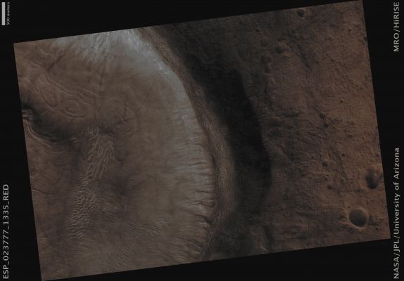 Unnamed Southern Crater with Gullies (Absolute Natural Colors; credits for the additional process. and color.: Dr Paolo C. Fienga - Lunexit Team)
Mars Local Time: 14:23 (Early Afternoon)
Coord. (centered): 46,3° South Lat. and 18,9° East Long.
Spacecraft altitude: 252,8 Km (such as about 158,0 miles) 
Original image scale range: 25,3 cm/pixel (with 1 x 1 binning) so objects ~ 76 cm across are resolved 
Map projected scale: 25 cm/pixel
Map projection: EQUIRECTANGULAR
Emission Angle: 3,0° 
Phase Angle: 50,3°
Solar Incidence Angle: 52° (meaning that the Sun is about 38° above the Local Horizon)
Solar Longitude: 349,1° (Northern Winter)
Credits: NASA/JPL/University of Arizona
Additional process. and coloring: Dr Paolo C. Fienga - Lunar Explorer Italia
Parole chiave: Mars from orbit - Craters - Unnamed Crater with Gullies