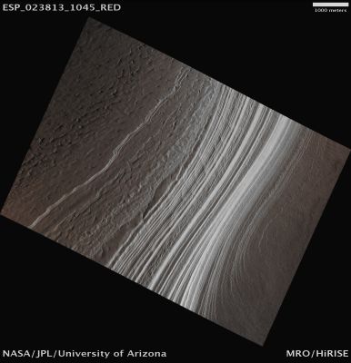 South presso-Polar Layers (Natural Colors; credits for the additional process. and color.: Dr Paolo C. Fienga - Lunexit Team)
Mars Local Time: 15:26 (Early Afternoon)
Coord. (centered): 76,3° South Lat. and 134,0° East Long.
Spacecraft altitude: 270,3 Km (such as about 169,0 miles) 
Original image scale range: 54,1 cm/pixel (with 2 x 2 binning) so objects ~ 1 mt and 52 cm across are resolved 
Map projected scale: 50 cm/pixel
Map projection: POLAR STEREOGRAPHIC
Emission Angle: 24,5° 
Sun-Mars-Spacecraft (or "Phase") Angle: 65,4°
Solar Incidence Angle: 78° (meaning that the Sun is about 12° above the Local Horizon)
Solar Longitude: 350,6° (Northern Winter)
Credits: NASA/JPL/University of Arizona
Additional process. and coloring: Dr Paolo C. Fienga - Lunar Explorer Italia
Parole chiave: Mars from orbit - South Polar Features - Layers