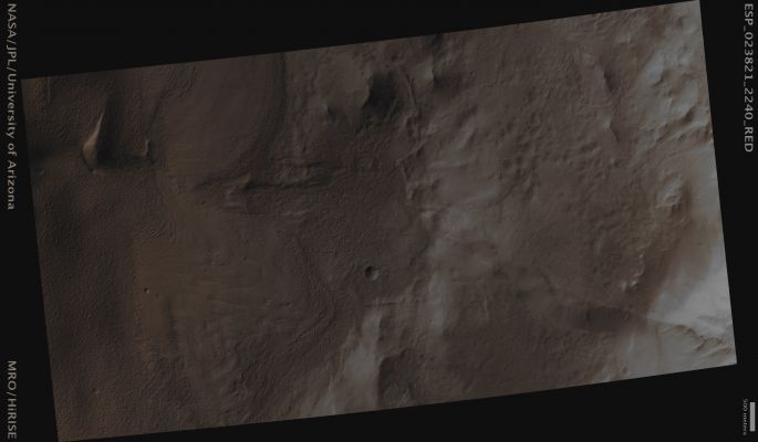 Fractured Unnamed Crater near Alba Patera (Absolute Natural Colors; credits for the additional process. and color.: Dr Paolo C. Fienga - Lunexit Team) 
Mars Local Time: 14:05 (Early Afternoon)
Coord. (centered): 43,5° North Lat. and 246,1° East Long.
Spacecraft altitude: 294,4 Km (such as about 184,0 miles) 
Original image scale range: 58,9 cm/pixel (with 2 x 2 binning) so objects ~ 1 mt and 77 cm across are resolved 
Map projected scale: 50 cm/pixel
Map projection: EQUIRECTANGULAR
Emission Angle: 8,4° 
Sun-Mars-Spacecraft (or "Phase") Angle: 49,6°
Solar Incidence Angle: 55° (meaning that the Sun is about 35° above the Local Horizon)
Solar Longitude: 350,9° (Northern Winter)
Credits: NASA/JPL/University of Arizona
Additional process. and coloring: Dr Paolo C. Fienga - Lunar Explorer Italia
Parole chiave: Mars from orbit - Craters - Unnamed Crater with Fracture