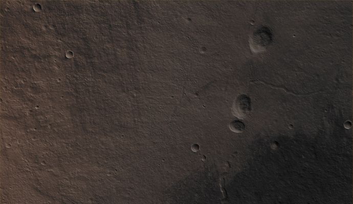 Small Volcano near Western Mareotis Tholus (CTX "A" - Absolute Natural Colors; credits for the additional process. and color.: Dr Paolo C. Fienga - Lunexit Team)
Mars Local Time: 14:09 (Early Afternoon)
Coord. (centered): 36,5° North Lat. and 271,5° East Long.
Spacecraft altitude: 289,6 Km (such as about 181,0 miles) 
Original image scale range: 29,0 cm/pixel (with 1 x 1 binning) so objects ~ 87 cm across are resolved 
Map projected scale: 25 cm/pixel
Map projection: EQUIRECTANGULAR
Emission Angle: 0,8° 
Sun-Mars-Spacecraft (or "Phase") Angle: 46,3°
Solar Incidence Angle: 47° (meaning that the Sun is about 43° above the Local Horizon)
Solar Longitude: 1,8° (Northern Spring)
Credits: NASA/JPL/University of Arizona
Additional process. and coloring: Dr Paolo C. Fienga - Lunar Explorer Italia
Parole chiave: Mars from orbit - Volcanoes - Unnamed Small Volcano